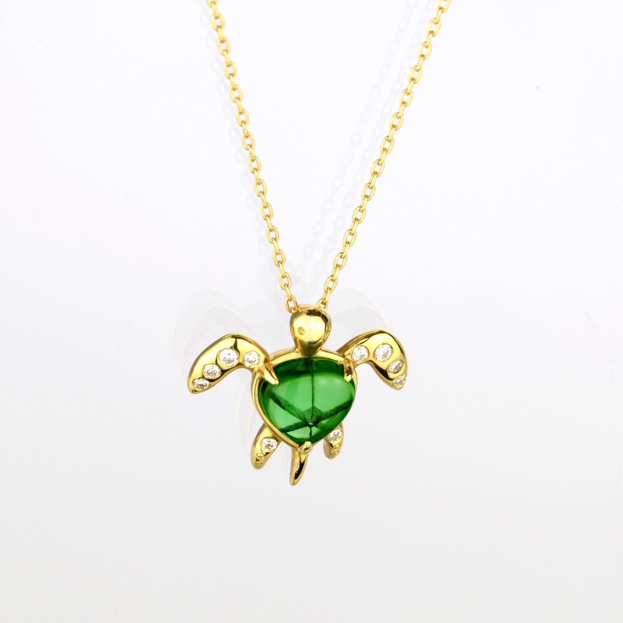 エメラルドトラピッチェゴールドカメネックレス0.86ct(中央宝石研究所宝石鑑別書付)