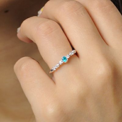 ブラジル産バターリャ鉱山パライバトルマリン0.06ct プラチナリングダイヤ0.165ct付 (中央宝石研究所宝石鑑別書付)