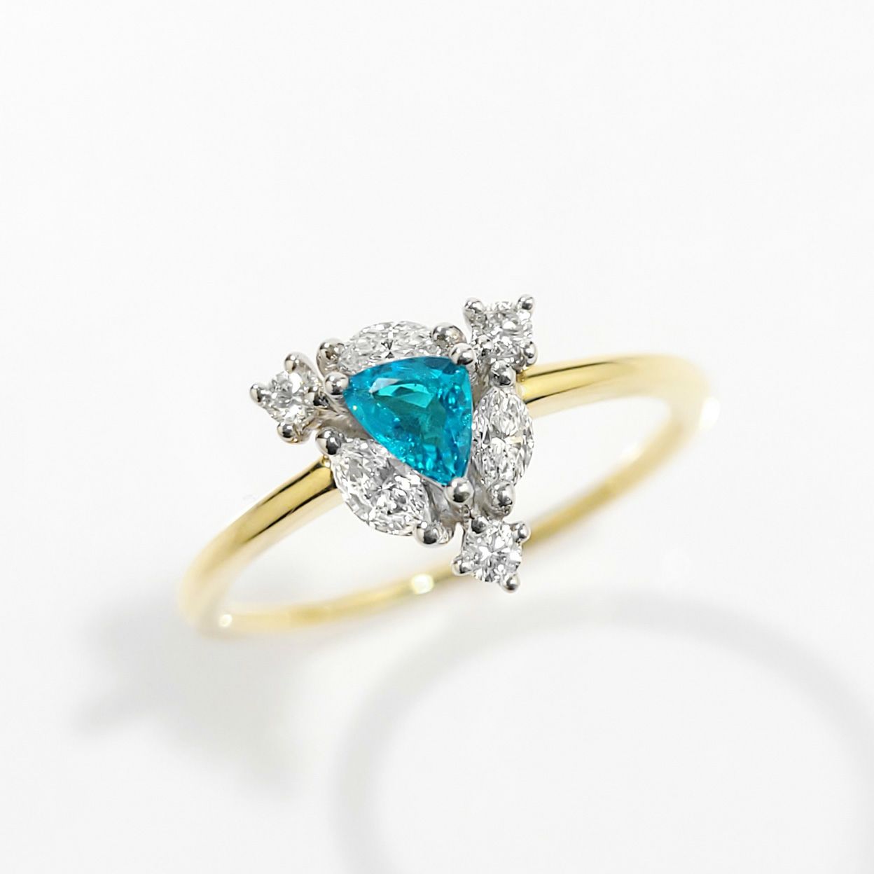 ブラジル産バターリャ鉱山パライバトルマリン0.18ctプラチナK18ゴールドリングダイヤ0.24ct付(中央宝石研究所宝石鑑別書付)