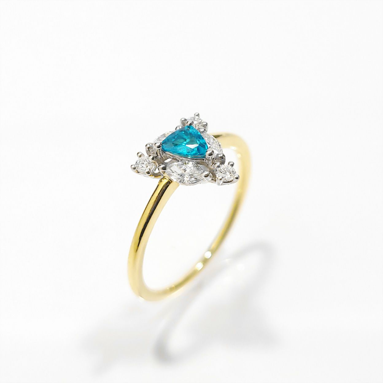 ブラジル産バターリャ鉱山パライバトルマリン0.18ctプラチナK18ゴールドリングダイヤ0.24ct付(中央宝石研究所宝石鑑別書付)