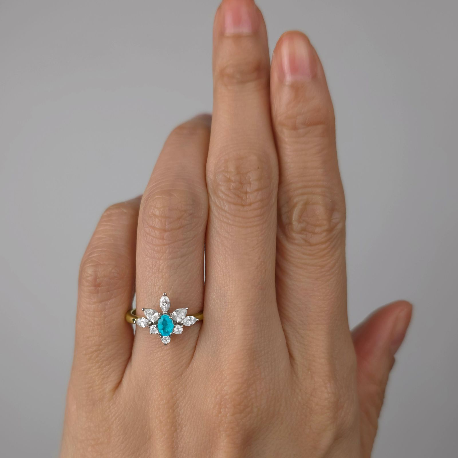 ブラジル産バターリャ鉱山パライバトルマリン0.16ctプラチナK18ゴールドリングダイヤ0.55ct付(中央宝石研究所宝石鑑別書 GIA宝石鑑別書付)