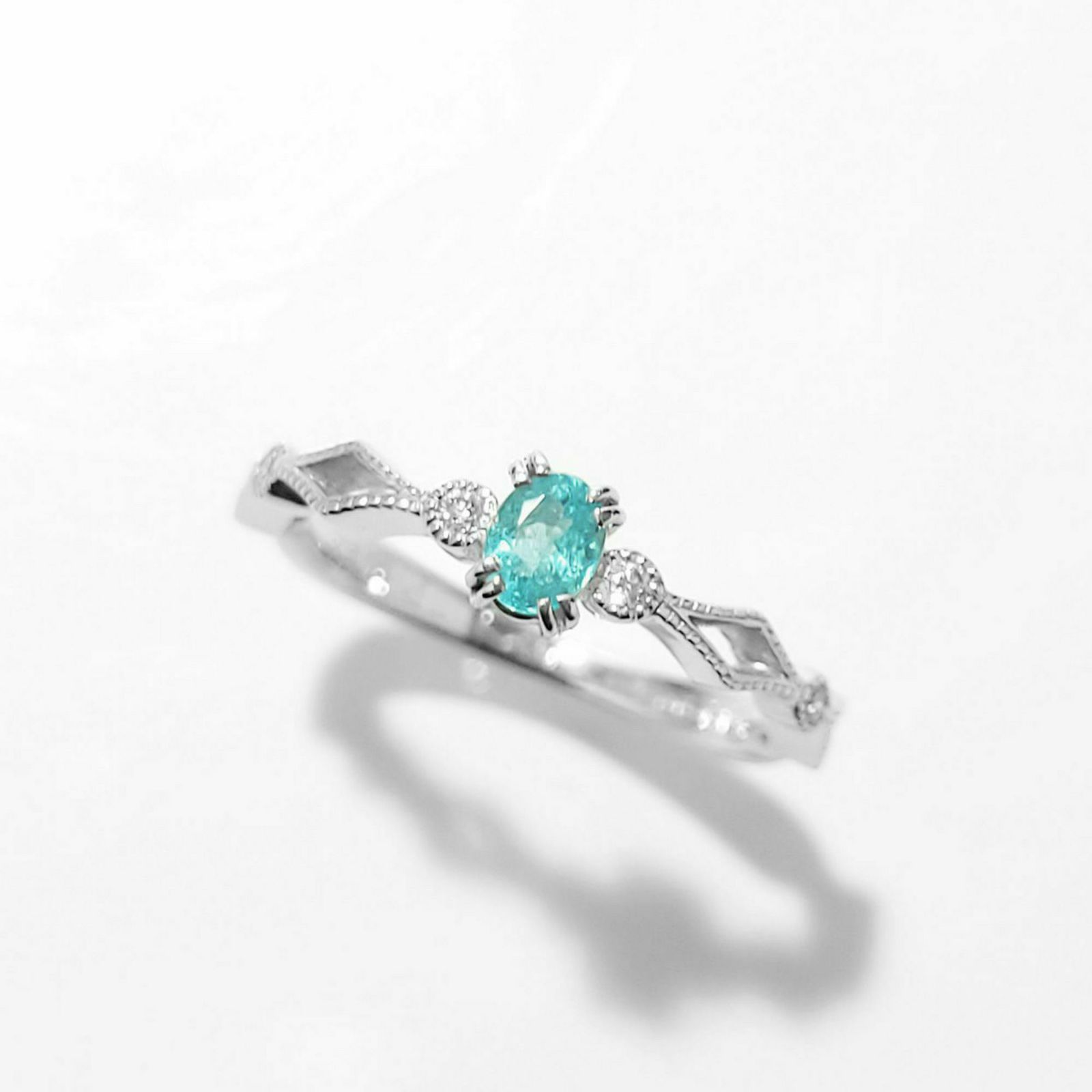 ブラジル産パライバトルマリン0.19ctK18ホワイトゴールドリングダイヤ0.04ct付